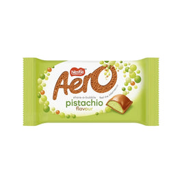 Nestle Aero Pistachio Chocolate 90g, front of the pack with a bitten bar piece shown.