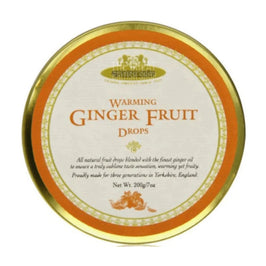 Simpkins Warming Ginger Fruit Drops 200g: the round gold tin lid viewed from above.
