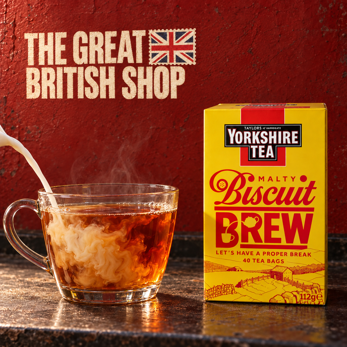 Yorkshire Tea Malty Biscuit Brew 40 teabags with milk swirling into tea and The Great British Shop name painted into the red wall.