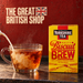 Yorkshire Tea Malty Biscuit Brew 40 teabags with milk swirling into tea and The Great British Shop name painted into the red wall.